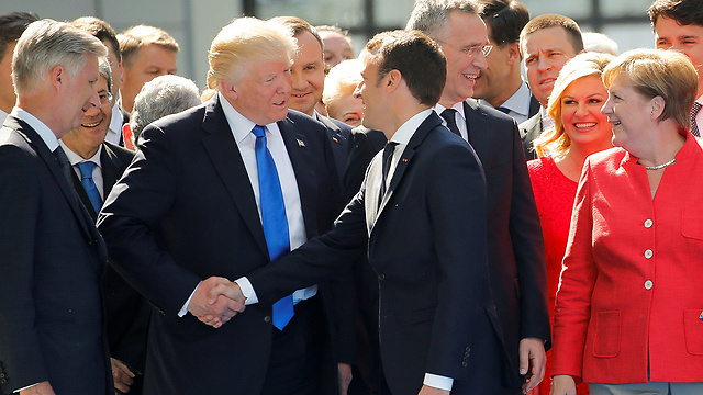 Trump, Macron and Merkel (Photo: Reuters)