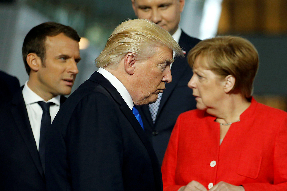 Trump and Merkel at the NATO meeting in Brussels (Photo: Reuters)