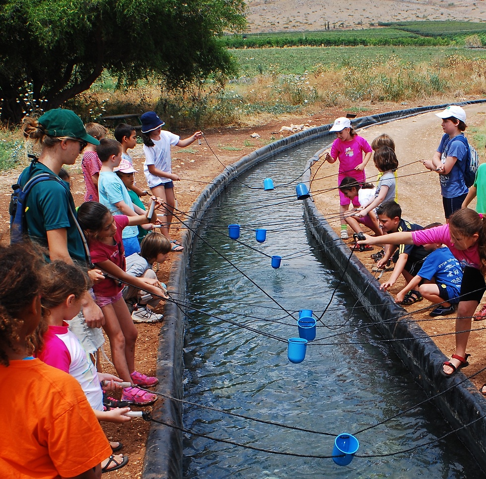 Drawing water at the Spring Valley Park (Photo: Ashar Bezer)
