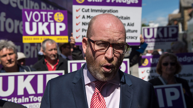 בבחירות הקודמות קיבלה מפלגתו יותר משלושה מיליון קולות, אבל הכניסה רק חבר אחד לפרלמנט. מנהיג מפלגת העצמאות הבריטית (UKIP) פול נוטאל (צילום: AFP) (צילום: AFP)