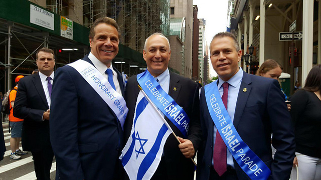 Gov. Andrew Cuomo (L), Chemi Peres (C) and Minister Gilad Erdan (R)