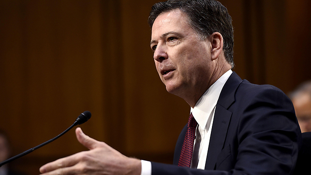 ראש ה-FBI המודח ג'יימס קומי. אז מי דובר אמת? (צילום: AFP) (צילום: AFP)