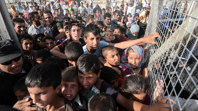 ילדים פליטים במחנה באזור מוסול (צילום: AFP) (צילום: AFP)