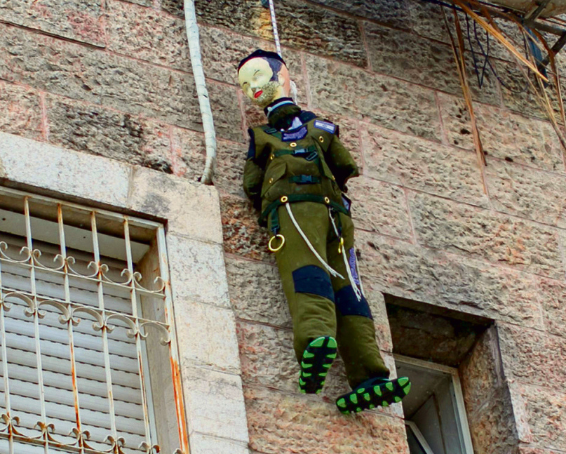 A soldier effigy hung in Mea Shearim. ‘This attitude towards soldiers is a wound and an unforgivable crime’ (Photo: Ohad Zwigenberg) 