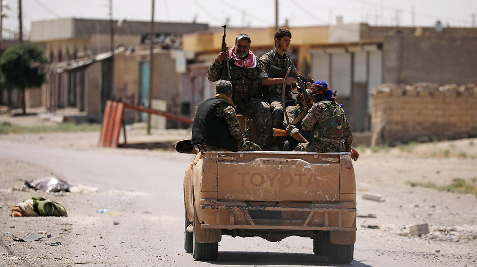 Syrian Democratic Forces fighters in Raqqa (Photo: Reuters) (Photo: Reuters)