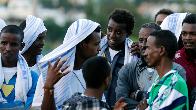 פליטים אריתראים באיטליה (ארכיון) (צילום: AP) (צילום: AP)