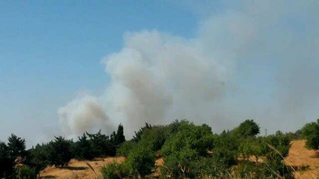 Smoke on Syrian border (Photo: 	Avihu Shapira)