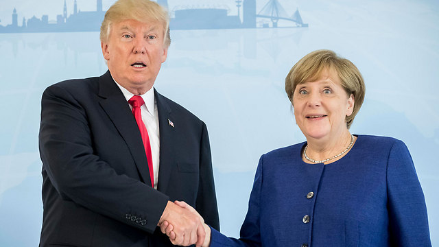 Trump and Merkel meet in Hamburg (Photo: AP)