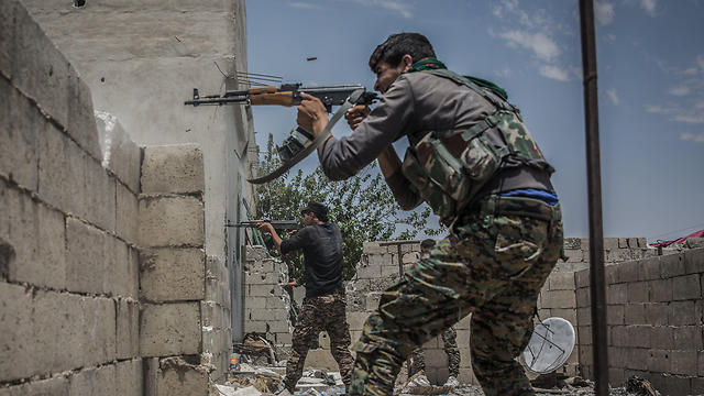 Free Syrian Army fighters in al-Raqqah, Saturday (Photo: MCT)