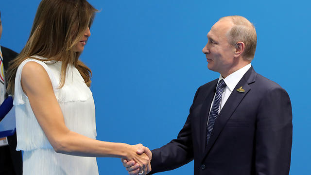 Мелания Трамп и Владимир Путин. Фото: АР