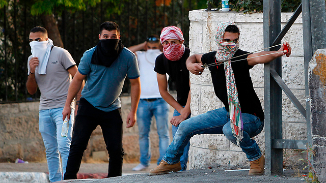 Demonstrators in Bethlehem rioting against added security measures at Temple Mount (Photo: AFP)