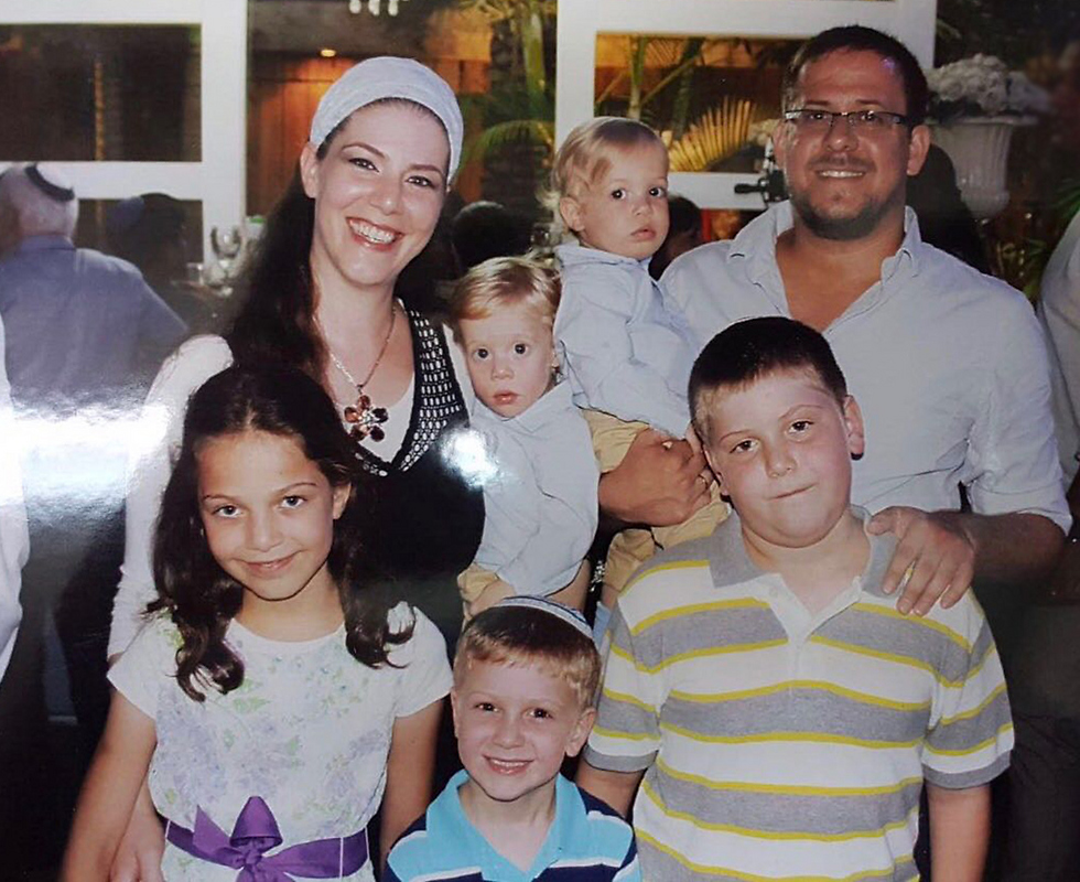 Michal and Elad Salomon with their five children.