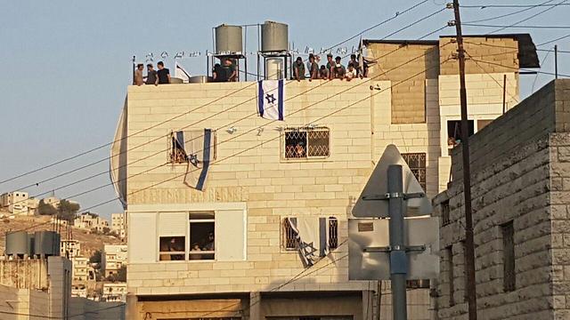 Settlers move into Machpelah House (Photo: TPS)