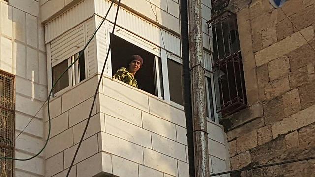 Settlers move into Machpelah House (Photo: TPS)