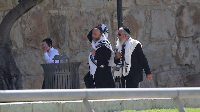 Two Haredi men in Jerusalem's Old City (Photo: Motti Kimchi)