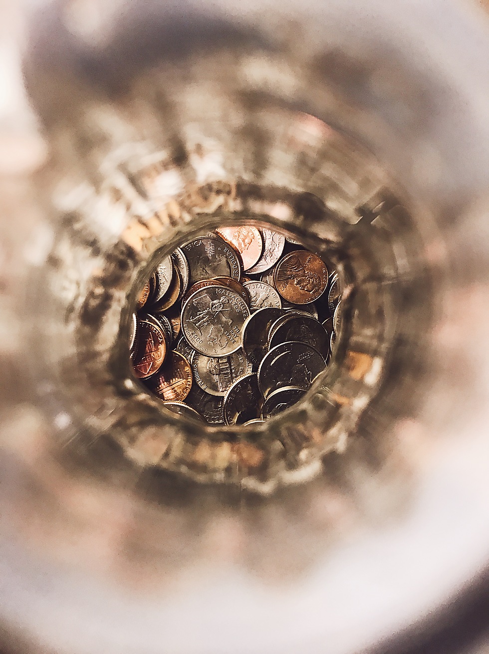 Sarah Strenger, Kulanu School of Jewish Studies, Margate, New Jersey, US: Sarah’s family has always collected tzedakah (charity) in an empty Jack Daniel’s bottle. This Jewish tradition goes back as long as she can remember, entwined in her childhood memories. Here, seen from the top, the bottle resembles a pond with the coins rippling out from the center, sending out waves of tzedakah to help those in need. 