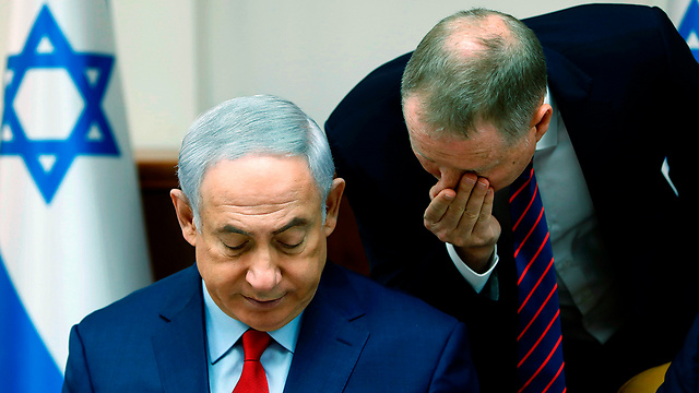 Netanyahu was at the center of attention but didn’t know anything? He has eyes but he can’t see? He has ears but he can’t hear? (Photo: AFP)