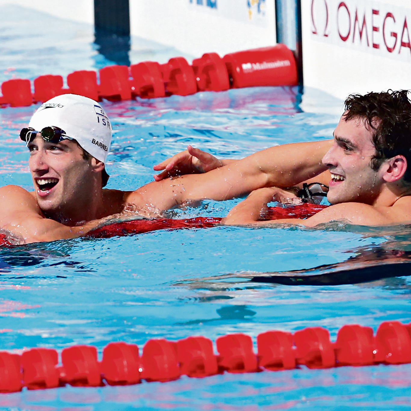 קופלב (מימין) עם גיא ברנע, באליפות העולם בשחייה בברצלונה 2013