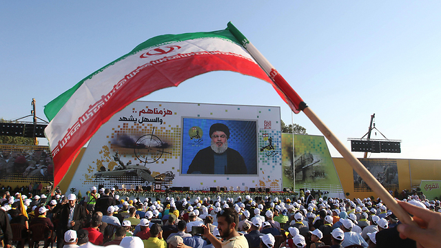 Iranian flag at a Hezbollah procession  (Photo: EPA)