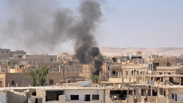 הפצצה במחוז א-סווידאא' (צילום: AFP) (צילום: AFP)