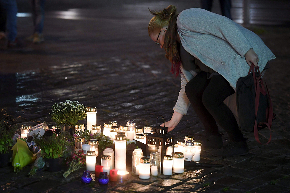 Vigil for the victims of the attack (Photo: AFP)