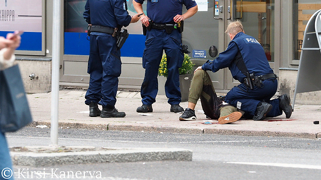 מעצרו של המחבל בפינלנד (צילום: רויטרס) (צילום: רויטרס)