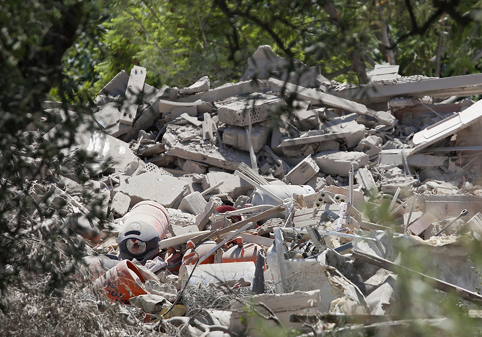 הריסות הבית שהתפוצץ באלקנאר (צילום: MCT) (צילום: MCT)