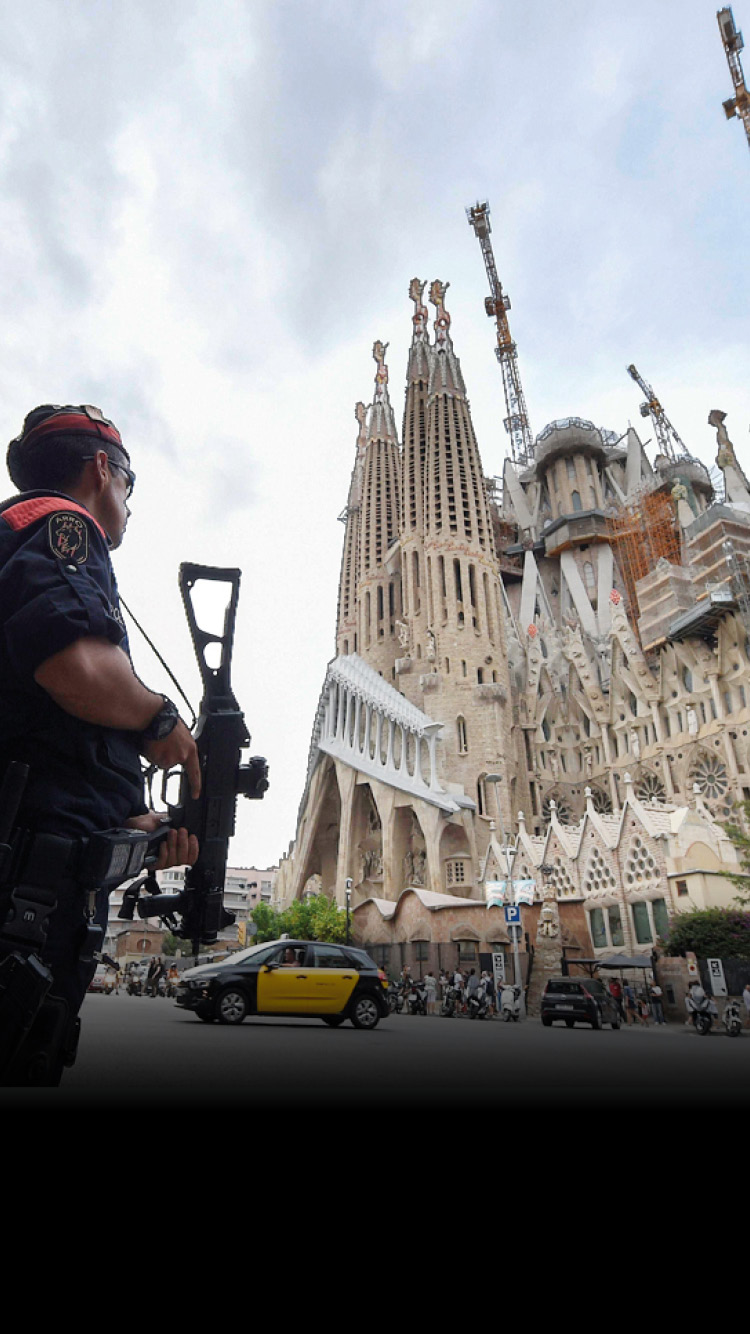 Armed security officer near the Sagrada Familia