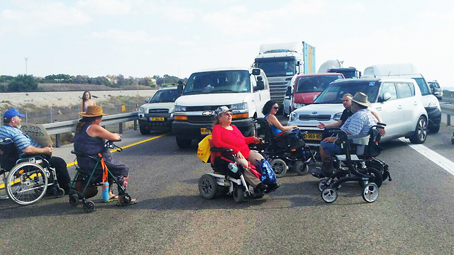Disabled protesters block Highway 2 at the entrance to Haifa (Photo: Alice Hayman)