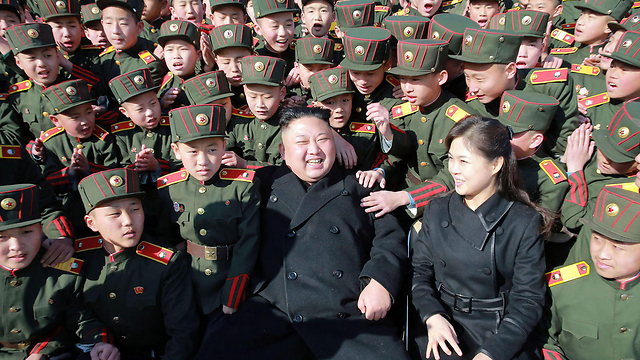 Ким Чен Ын и его супруга. Фото: AFP