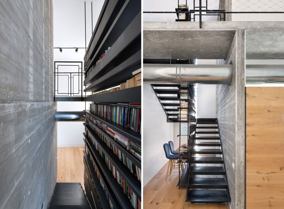 ספריית ברזל משמשת כמעקה (תקני) של המדרגות. החלל מתחתן נוצל לפינת עבודה, והן מסתיימות בגשר שמחבר בין אגפי הקומה העליונה (צילום: עמית גושר)