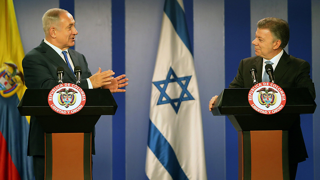 PM Netanyahu and President Juan Manuel Santos  (Photo: EPA)