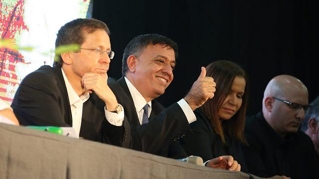 Gabbay, sitting with members of his party, after the vote was passed (Photo: Motti Kimchi)