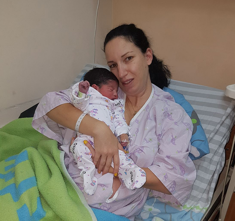 Sivan Alaluf with her baby girl