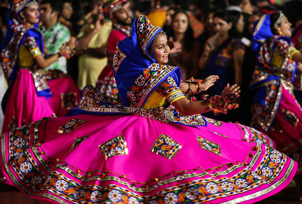 פסטיבל נווארטרי נערך מדי שנה בסתיו בהודו לכבוד האלה ההינדית דורגה ונמשך תשעה לילות (צילום: EPA) (צילום: EPA)