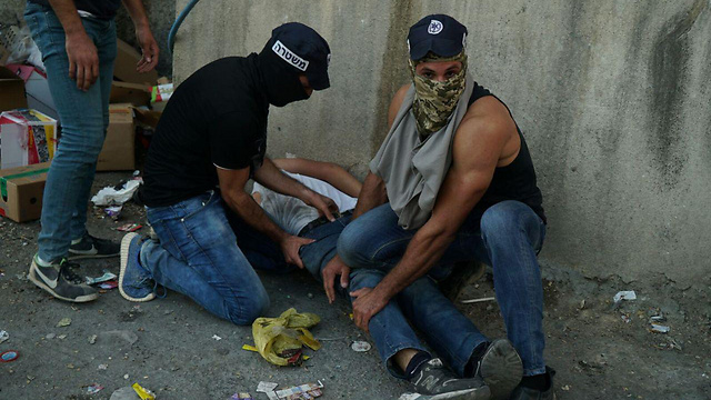 Undercover Border Police agents arrest rioters in Biddu (Photo: Israel Police)