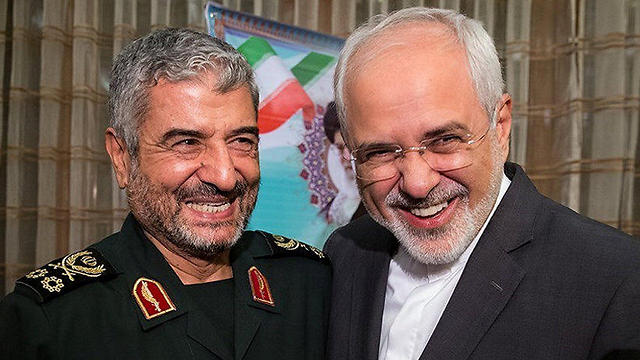 Islamic Revolutionary Guard Corps commander Mohammad Ali Jafari (L) with Iranian Foreign Minister Mohammad Javad Zarif (Photo: Reuters)