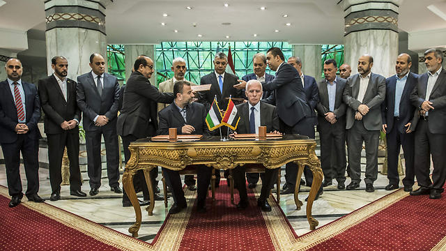 The warring Palestinian sides signed the reconliation agreement a little more than two months ago (Photo: AFP)