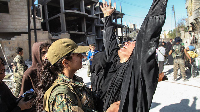 Raqqa resident escapes into arms of Kurdish Peshmerga fighter