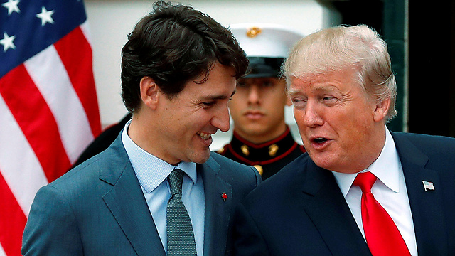 טראמפ עם ראש ממשלת קנדה טרודו. "החלטה בלתי מתקבלת על הדעת" (צילום: רויטרס) (צילום: רויטרס)