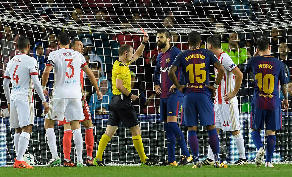 "Барселона" против "Олимпиакоса". Фото: AFP