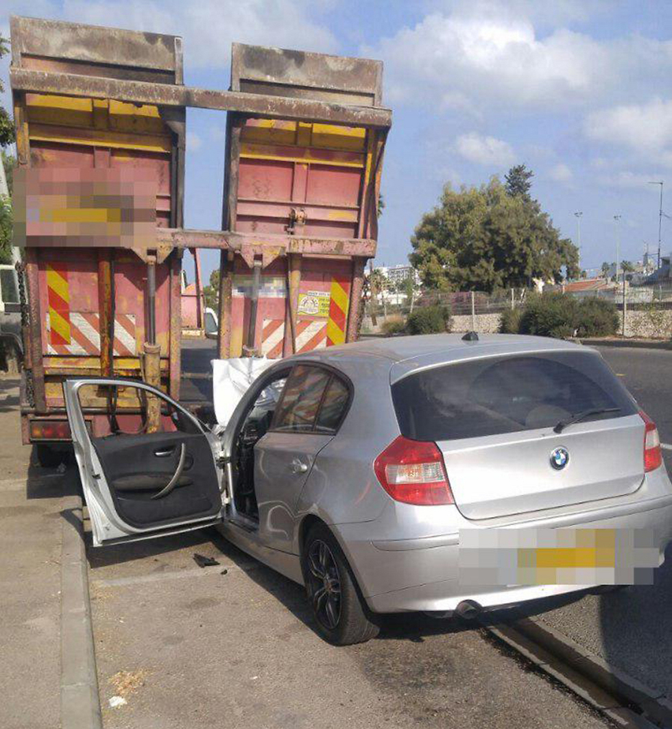 הרכב הפרטי שהתנגש במשאית בחיפה ()