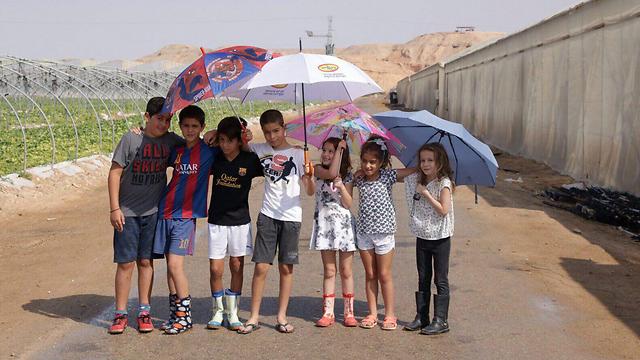 Summer clothes and umbrellas in Ein Yahav (Photo: Arava Tichona PR)