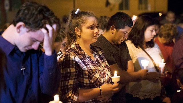Vigil following shooting (Photo: AP)