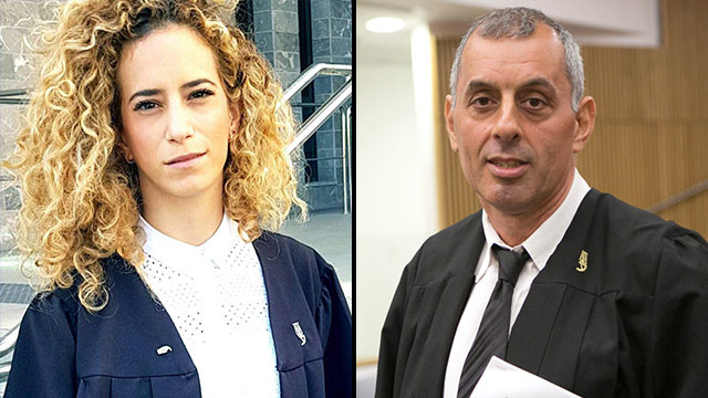 עורכי הדין אהוד בן יהודה ואורלי אמוץ ()