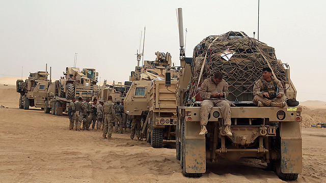 "יש לנו בסיסים יקרים מאוד". כוחות אמריקניים בעיראק (צילום: AP) (צילום: AP)