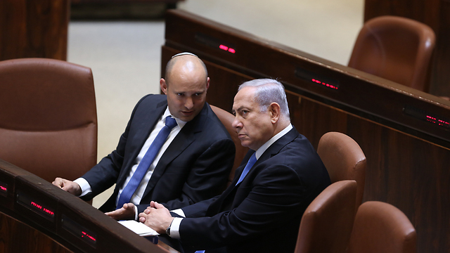 Naftali Bennett and PM Netanyahu (Photo: Alex Kolomoisky)