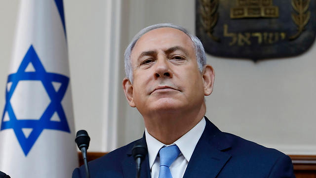 Is the prime minister trying to disrupt his investigation by enacting a law at the Knesset? That’s a question only the police can answer (Photo: AP)