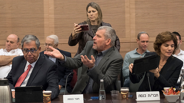 Shouting in the committee (L to R: opposition MKs Mickey Levy, Miki Rosenthal and Tamar Zandberg) (Photo: Yoav Dudkevitch)