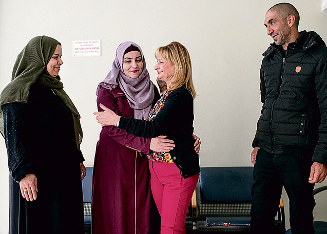 Bassa with Saja, her mother and her uncle. 'I love you. I'm alive thanks to you' (Photo: Ohad Zwigenberg)